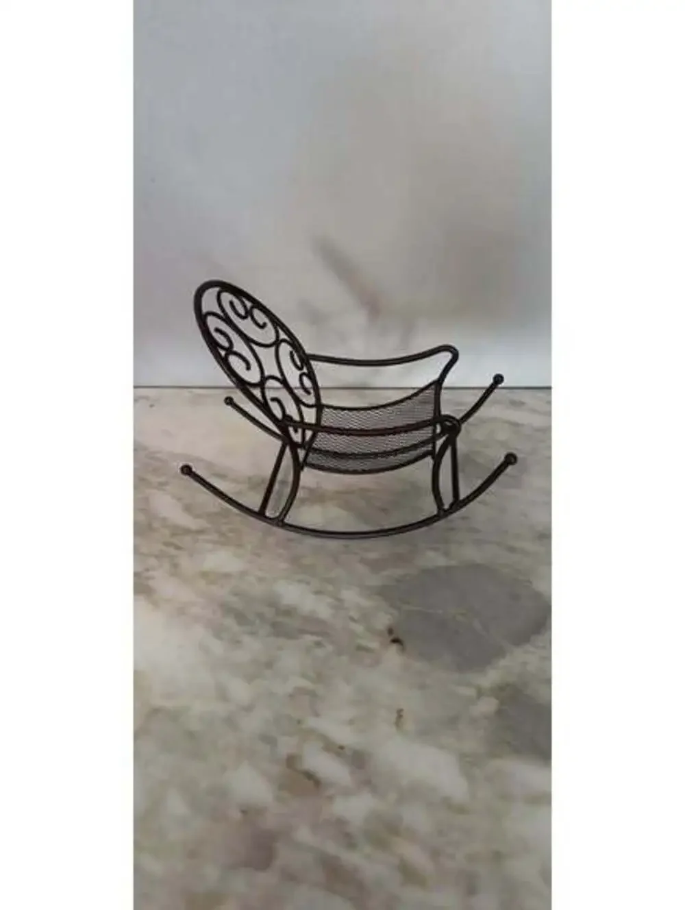 Vintage miniature wire mesh dollhouse rocking chair with scrollwork back